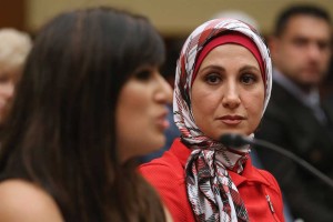 Sarah Hekmati listens as Nagameh Abedini addresses the House Foreign Affairs Committee (Chip Somodevilla/Getty Images).
